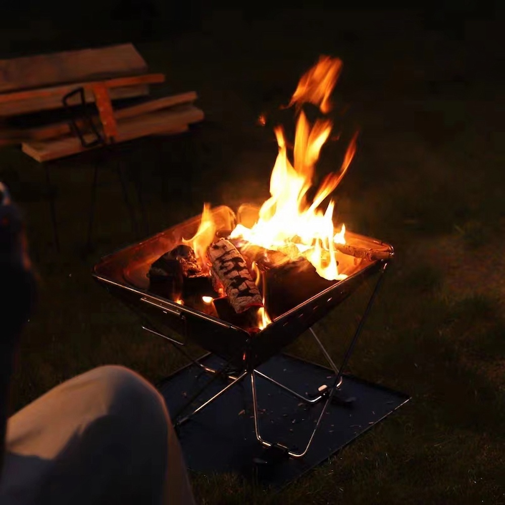Wie benutzt man einen Campingkocher für Brennholz sicher?